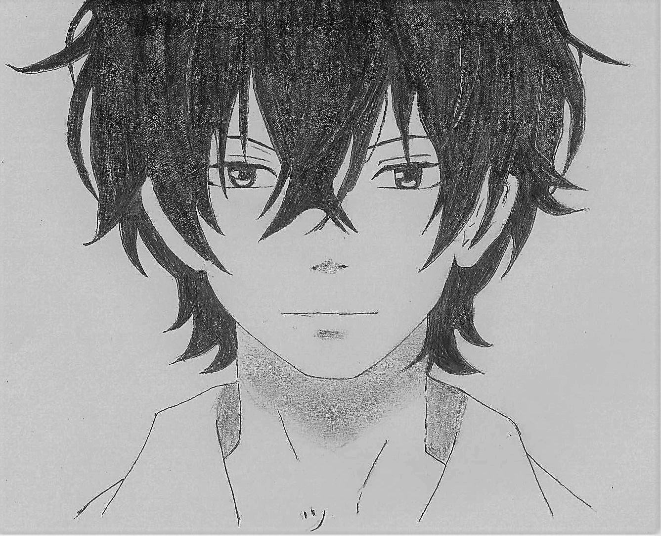 manga boy drawing with graphite pencils